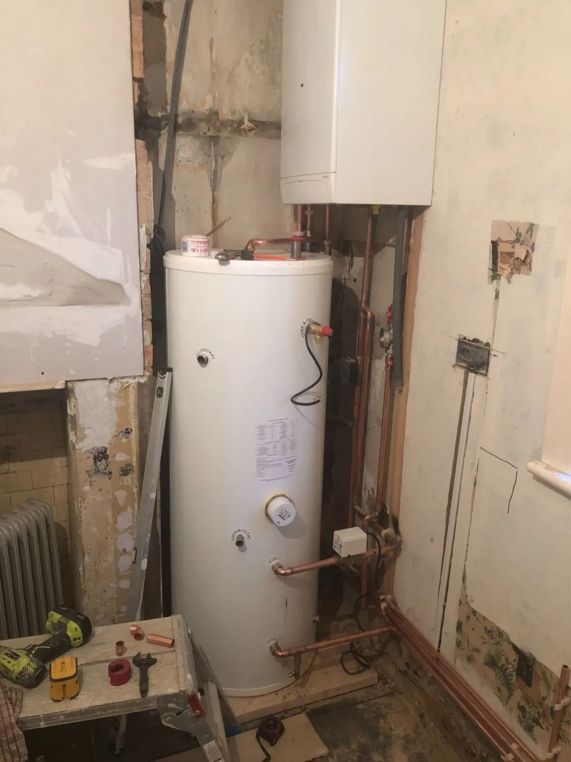 Conversion from gravity fed hot water tank to pressurised indirect system with BIASI system boiler