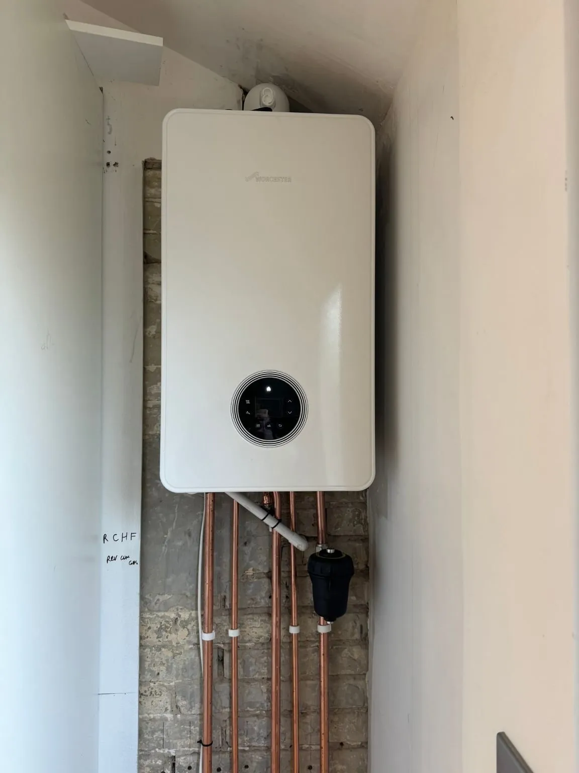 MK Plumbing & Heating performing a boiler upgrade and replacement installation in Moordown, featuring the new Worcester Bosch 4000